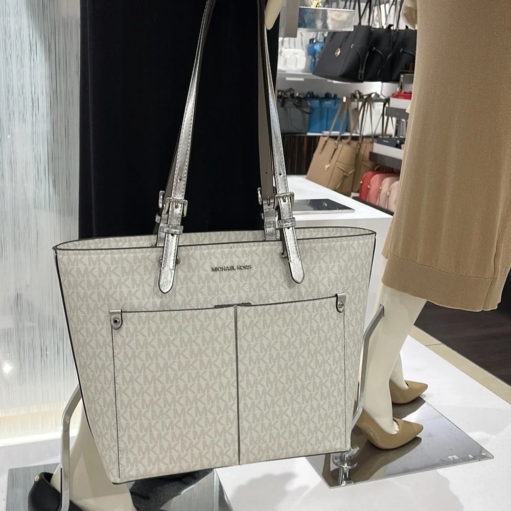 MICHAEL KORS OUTLET
Jet Set Medium Logo Pocket Tote Bag
Optic White/Silver 
NWT - Picture 4 of 16